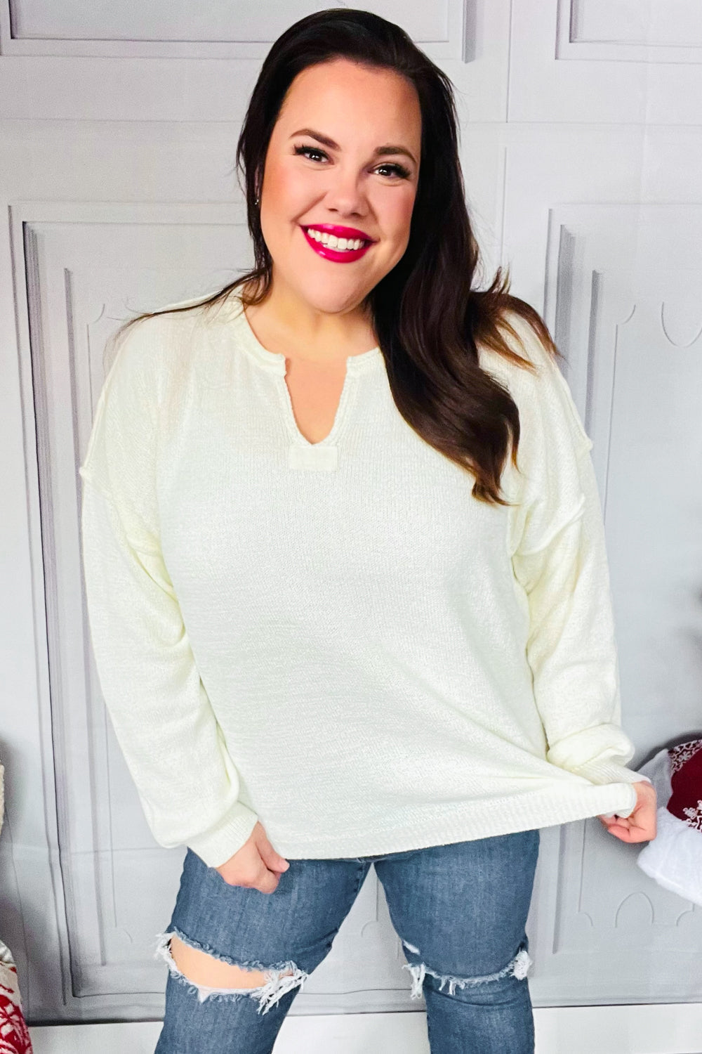 Avis® | Lock Eyes Ivory oversized sweater with notched neckline and patch